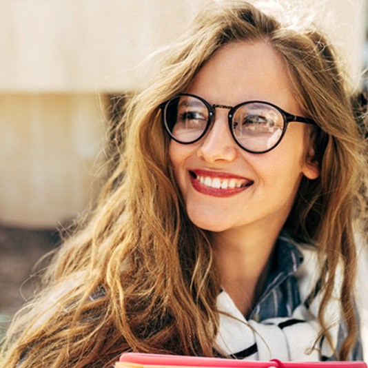 Woman smiling outside