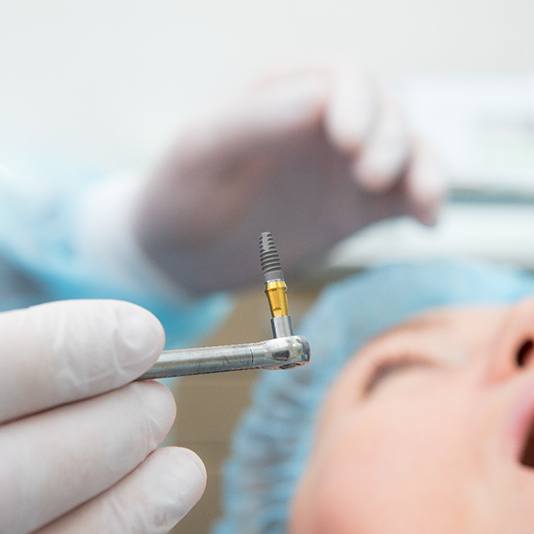 patient getting a dental implant