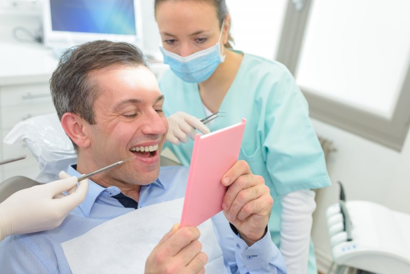 Man excited about his dental implants