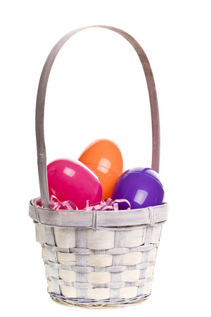 Child’s Easter basket with colorful plastic eggs